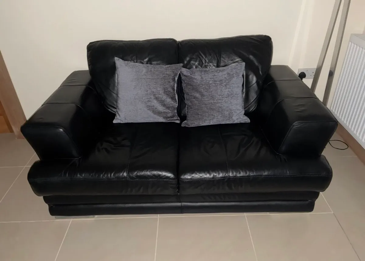 Italian leather two seater couch