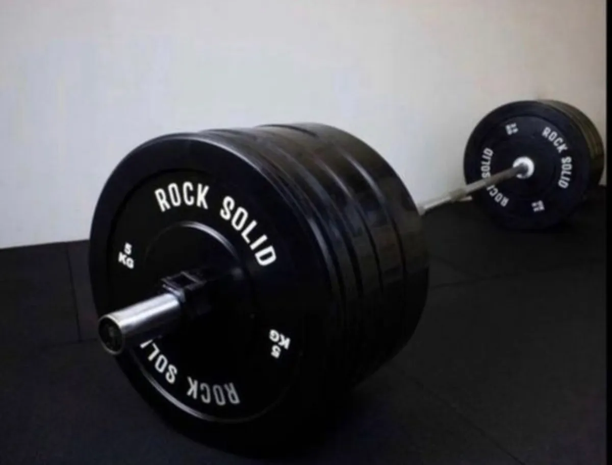 Olympic Barbell and weight plates 127.5kg (new) - Image 1