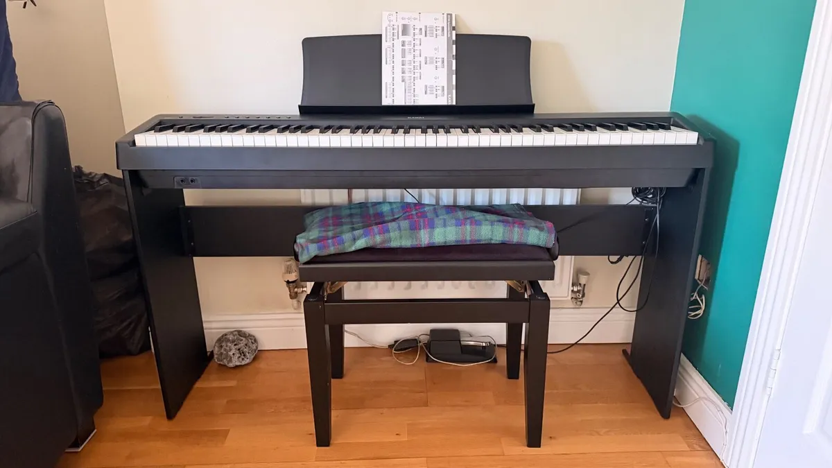 Giant Hybrid Bike + Kawai ES110 Digital Piano - Image 1