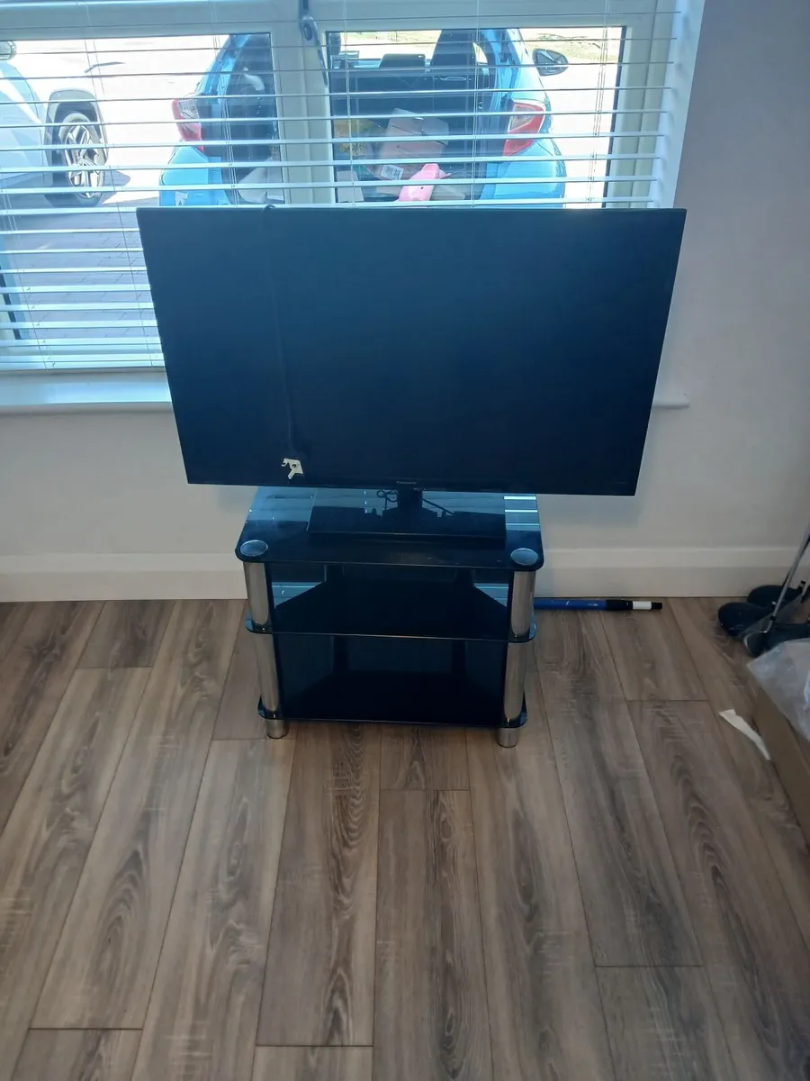 Tv and stand - Image 1