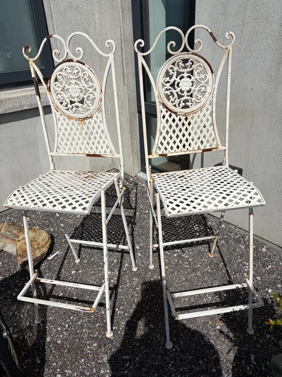 Two Wrought Iron High Garden Chairs