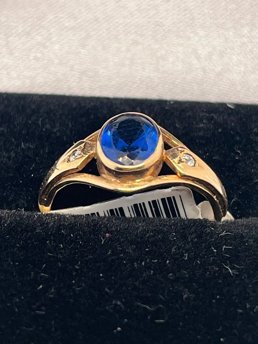 14k gold blue stone cz ring. - Image 1