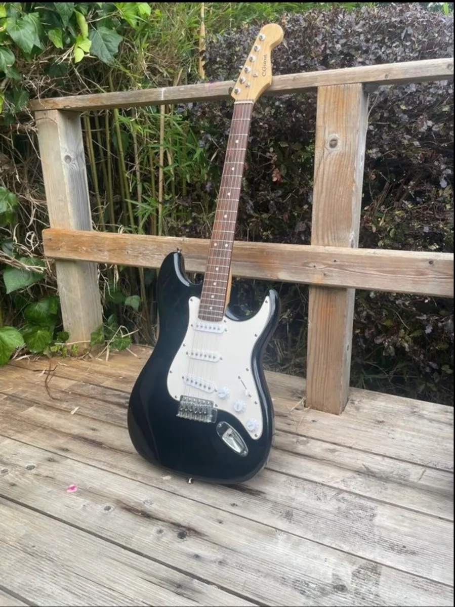 C. Giant Electric Guitar - Image 1