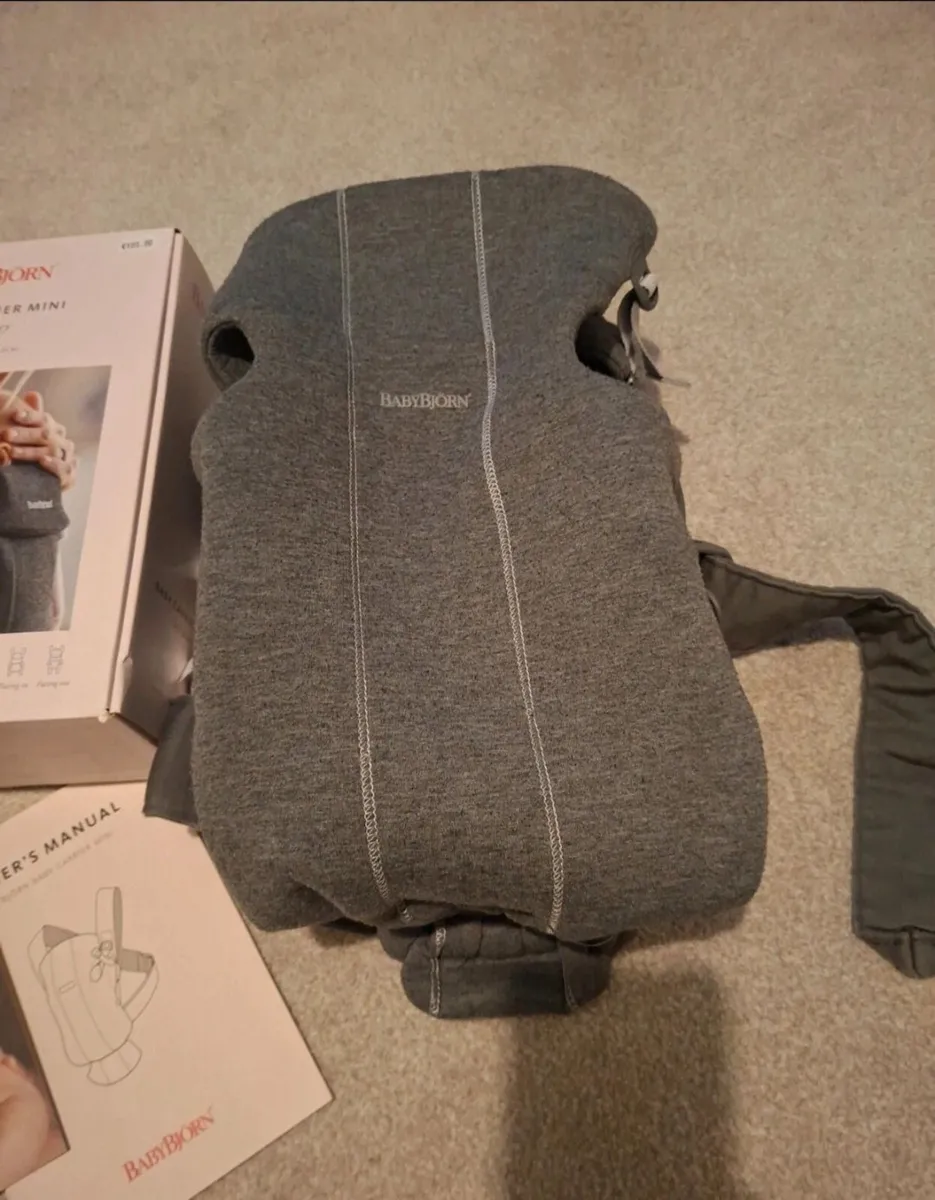 Baby Bjorn baby sling carrier - Image 1