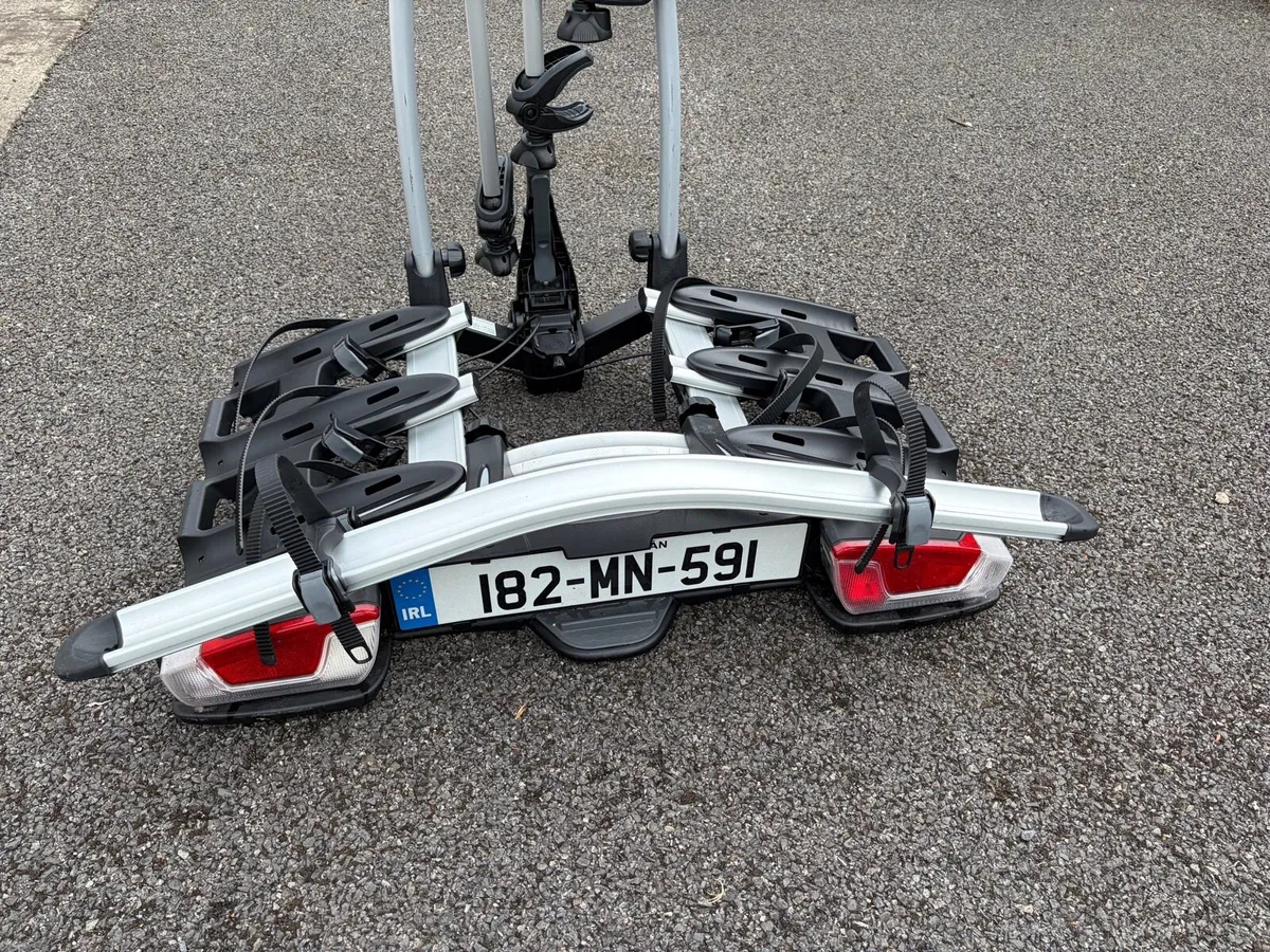 Thule 4 bike towbar rack tilting like new - Image 1