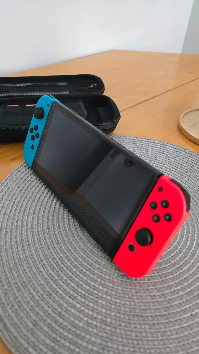 Nintendo Switch OLED + 2 Mario Games + Case & Acce - Image 1