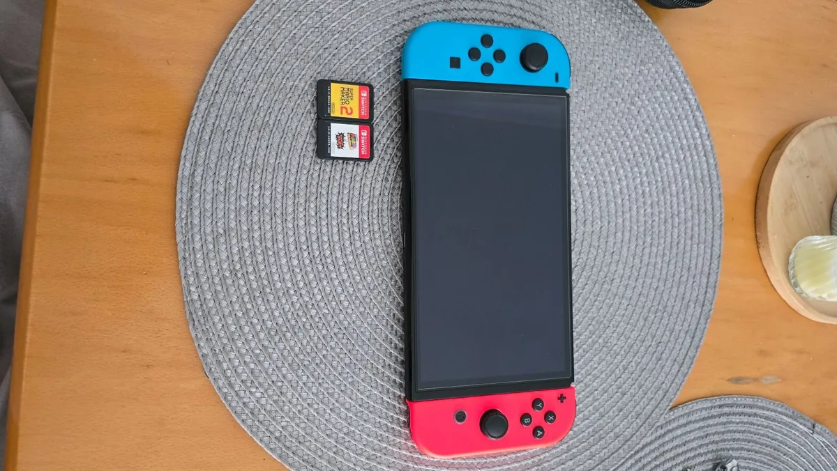 Nintendo Switch OLED + 2 Mario Games + Case & Acce - Image 3