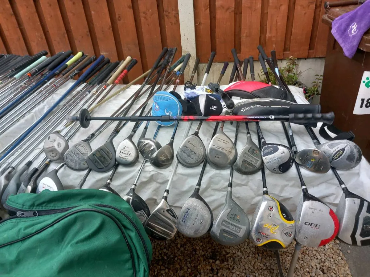 A selection of golf clubs and bags. - Image 3