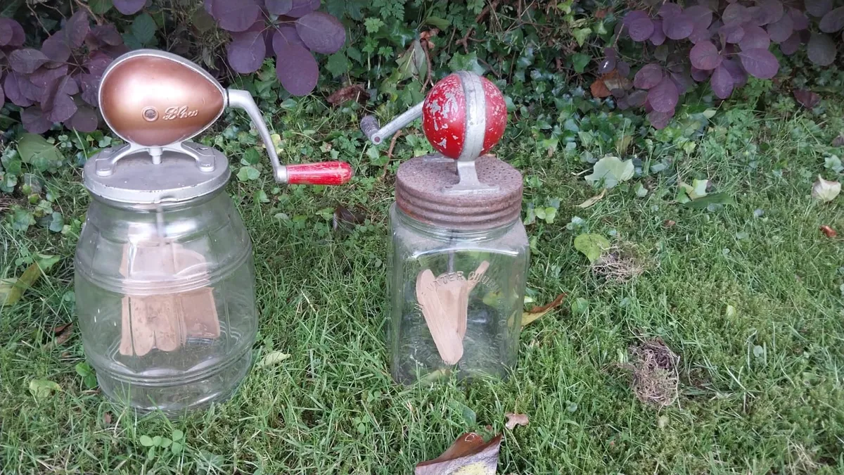 Glass butter churns x 2 - Image 1