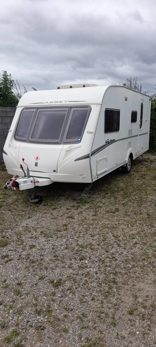 IMMACULATE 4 BERTH ABBY SPECTRUM TOURING CARAVAN. - Image 1