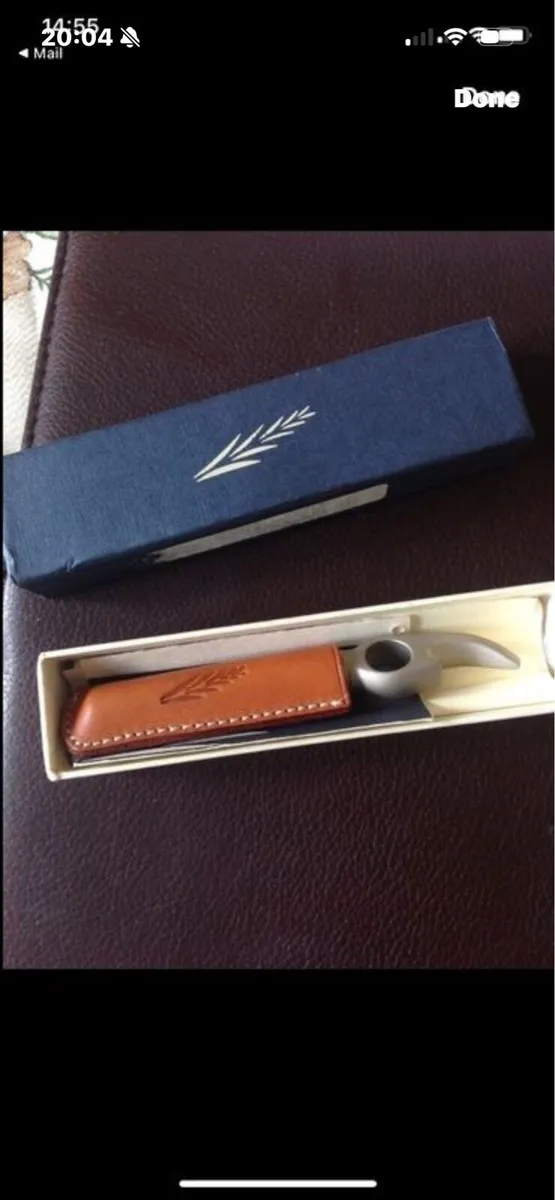 Corkscrew & Bottle Opener in Leather Case - Image 1