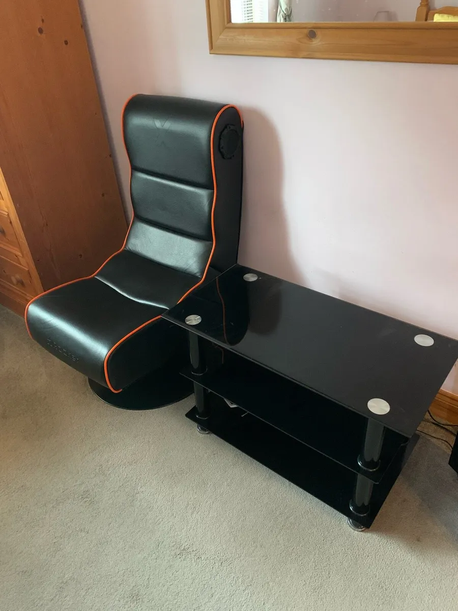 Gaming chair and tv stand