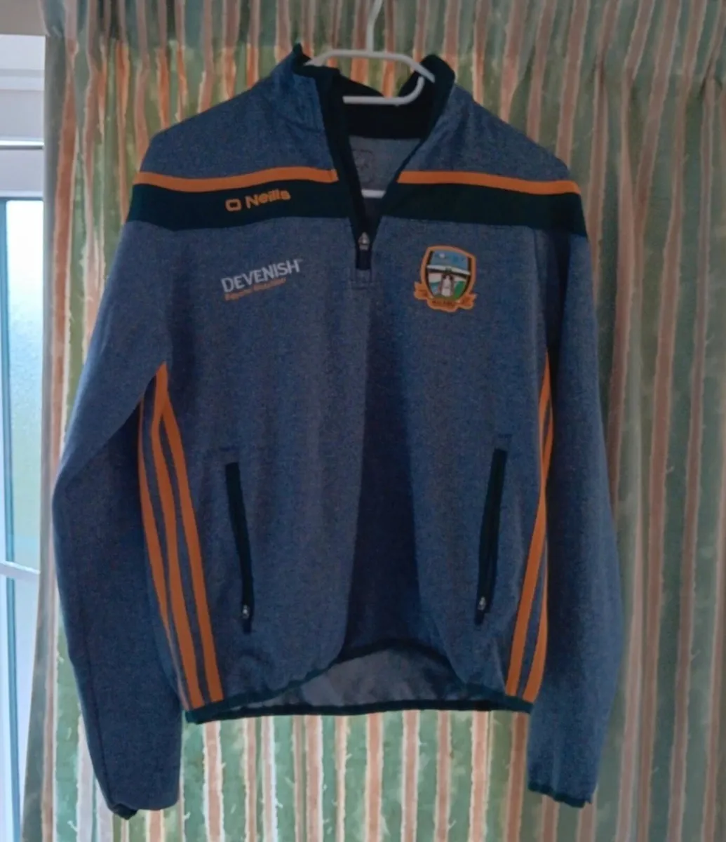 O'Neills Meath GAA Zip Top. Age 13. W:47, L:54 - Image 1