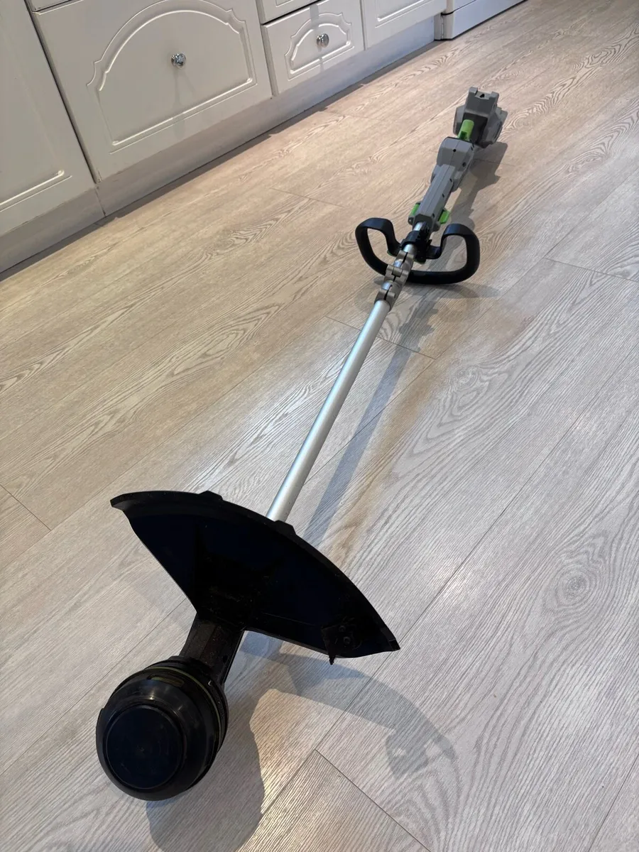 Cordless Line Trimmer. 56 Volt Lithium-Ion - Image 1