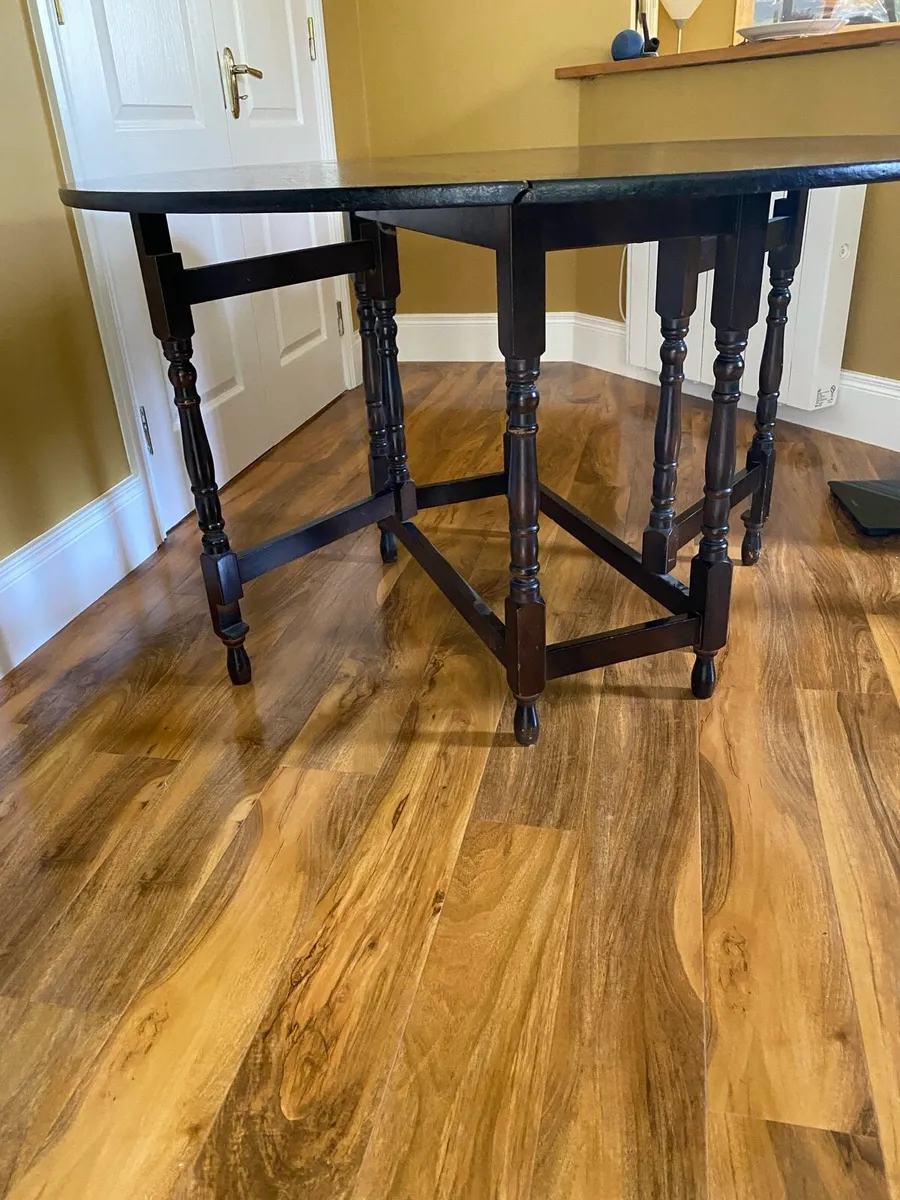 Folding Round Dining Table in Solid Dark Oak - Image 3