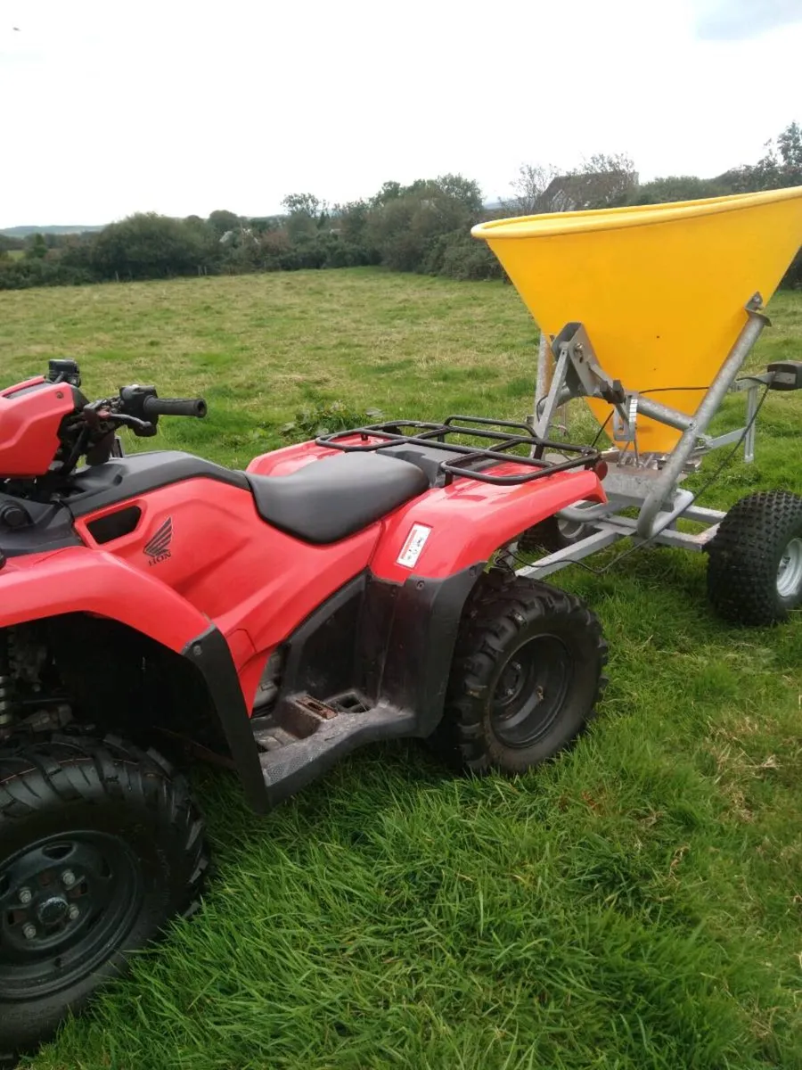 Quad with fertlizer spreader - Image 1
