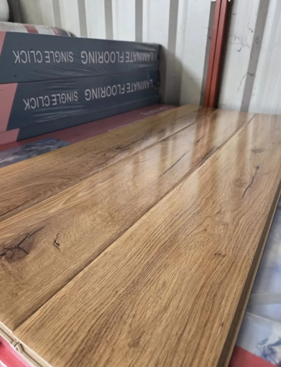 New 12mm high gloss flooring - Image 1