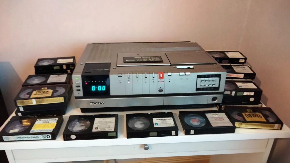 Betamax m/c. & 28 movies.