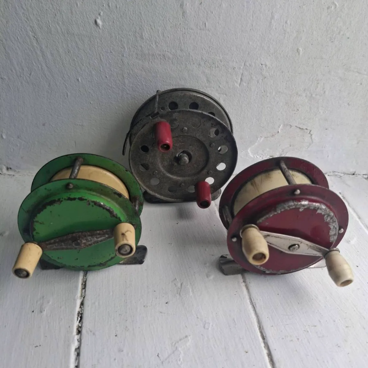 3 Vintage Metal Fishing Reels - Image 1