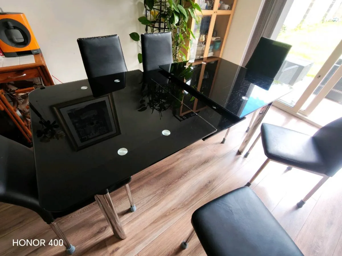Extendable Dining table and chairs - Image 1