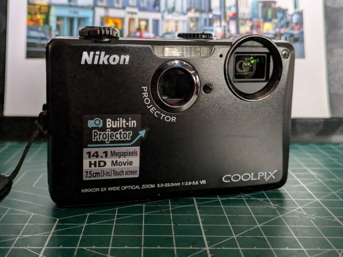 Nikon  S1100pj 14MP CCD🌈 camera with projector📽 - Image 1
