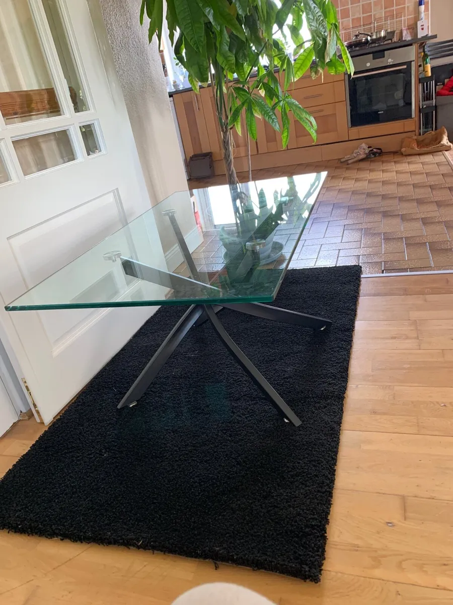 Coffee Table.. Black rug. - Image 1