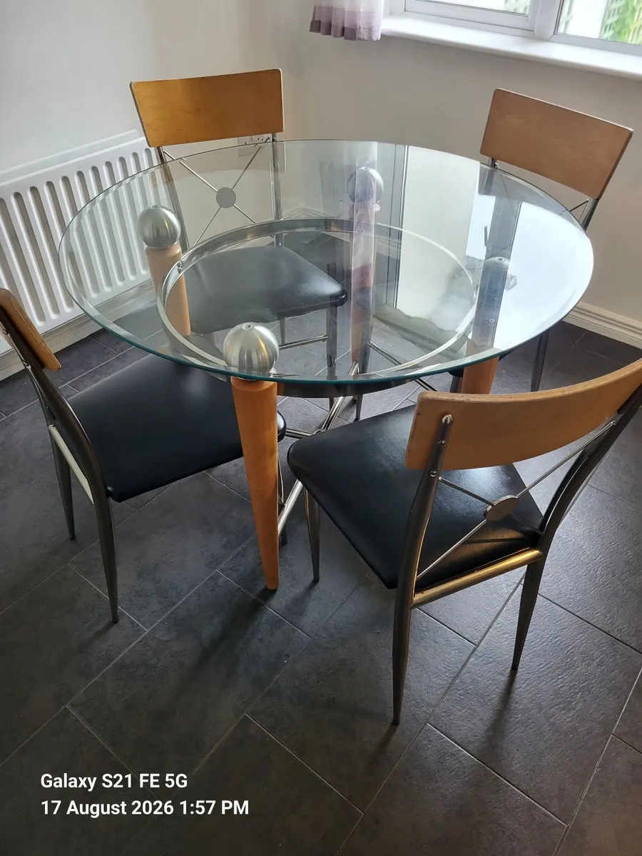 Designer round glass top table & 4 chairs - Image 1