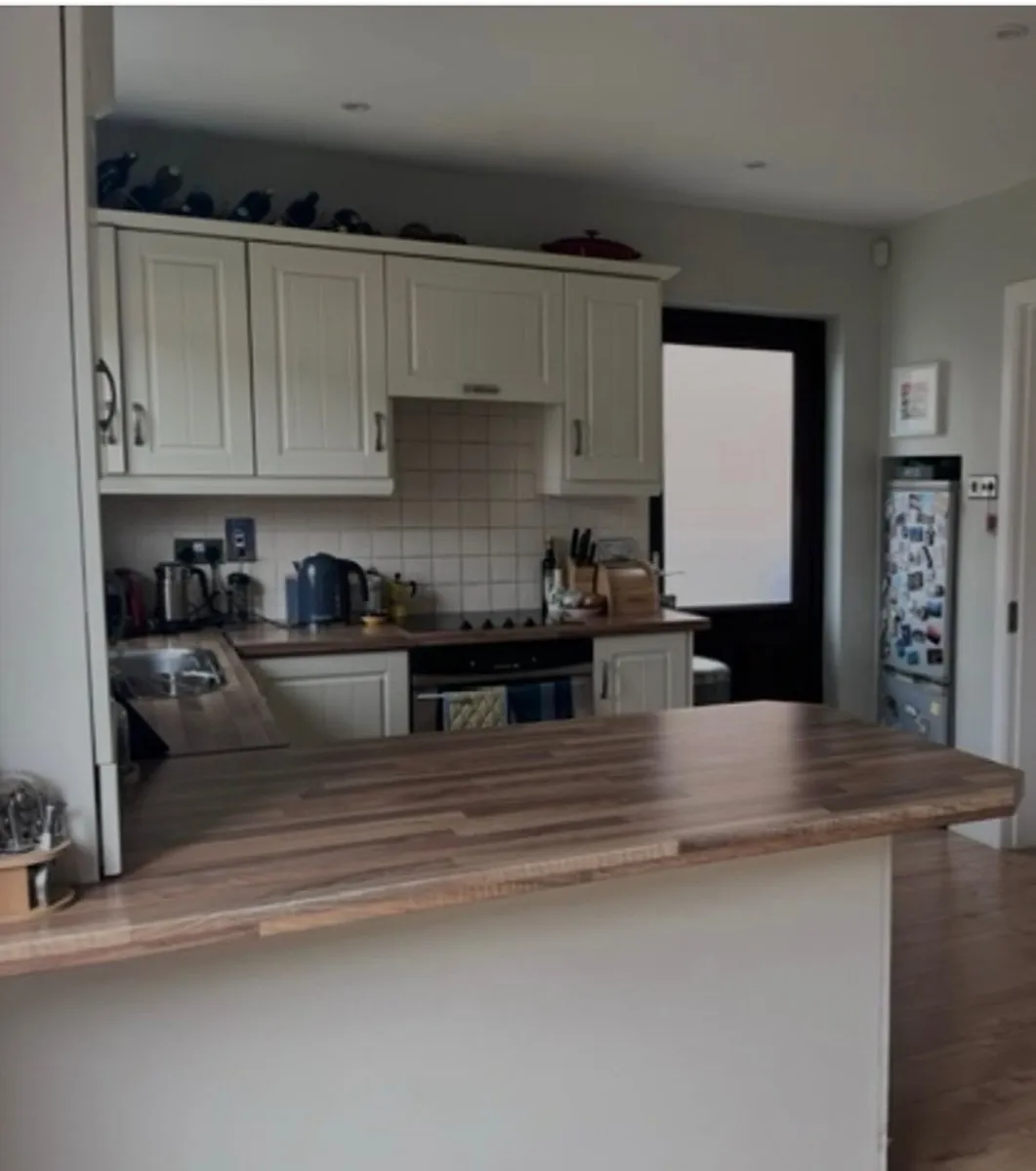 Kitchen units and peninsula - Image 2