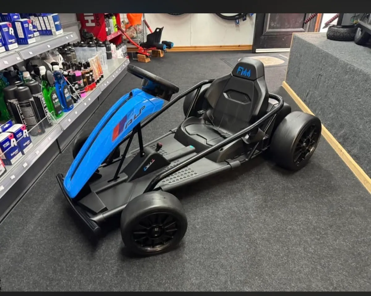 Drifter 24v Electric Go Kart in red and blue. - Image 3
