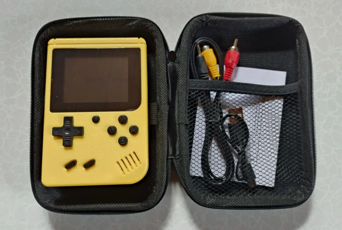 3 VIDEO GAME CONSOLES WITH CASES (NEW). - Image 1