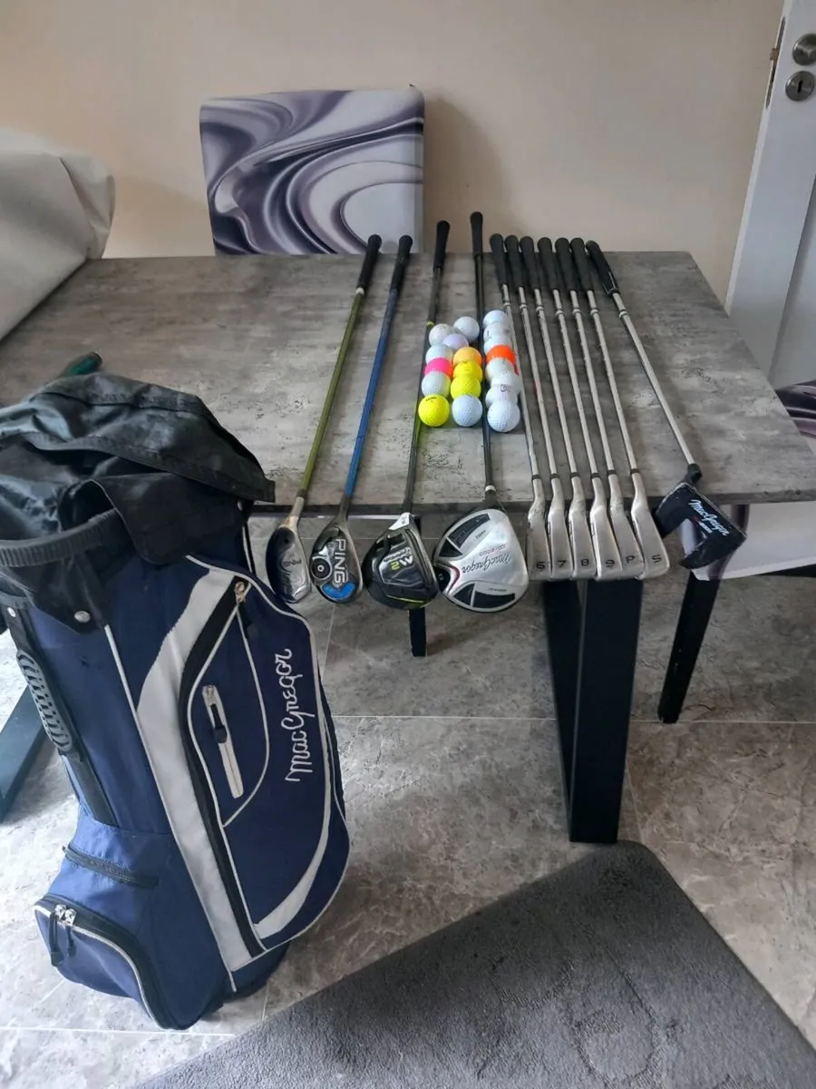Golf bag and clubs and golf balls. - Image 1