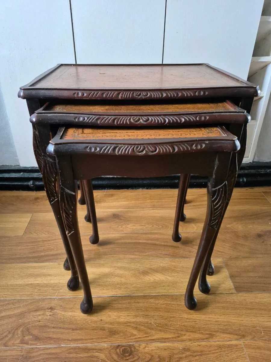 Carved nest of tables with leather top - Image 1