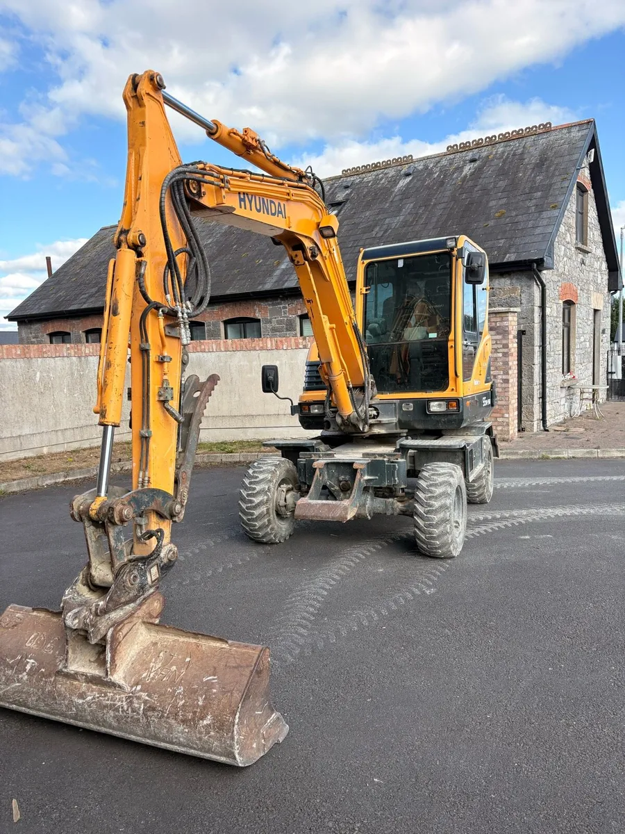 Hyundai 55w-9A - Image 1