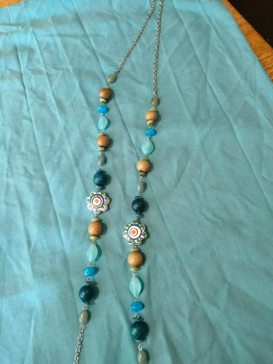 long, colorful beaded necklace featuring a mix of - Image 2