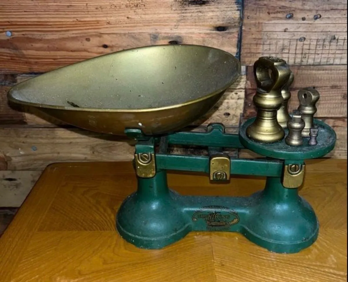 Vintage scales and brass bell weights