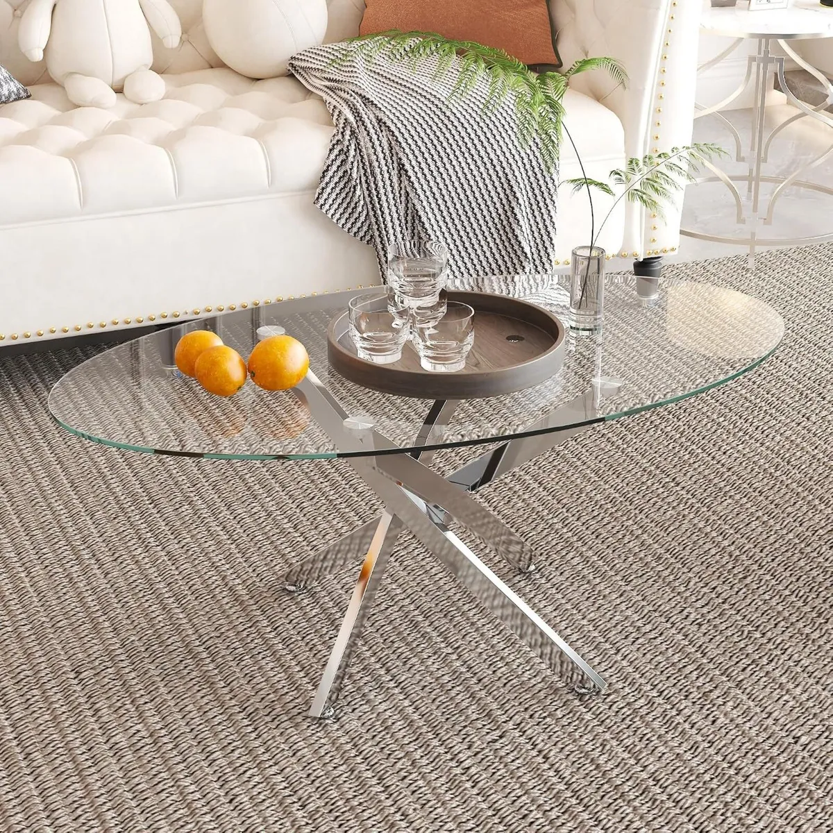 Oval Glass Coffee Table with Chrome Crossed Legs - Image 1