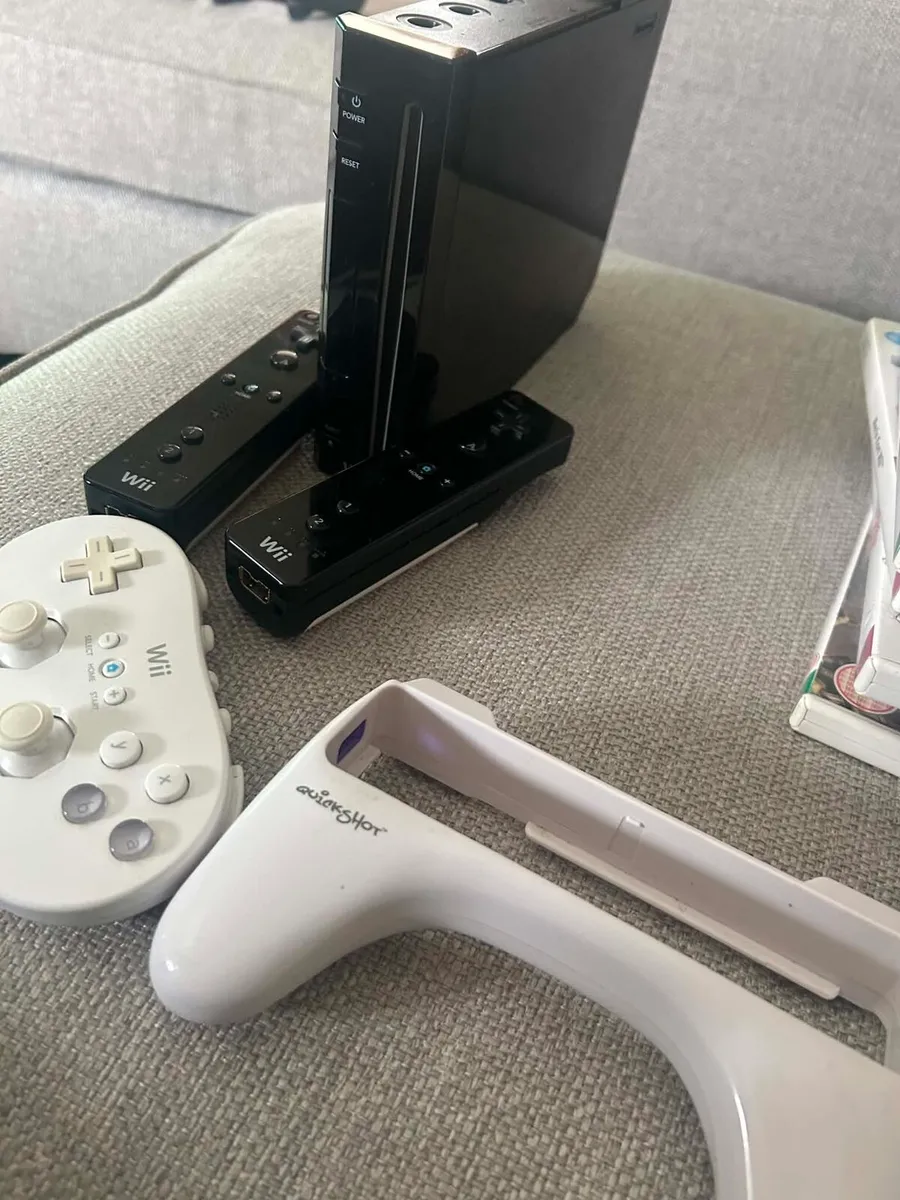 Nintendo Wii with Games and Accessories - Image 1