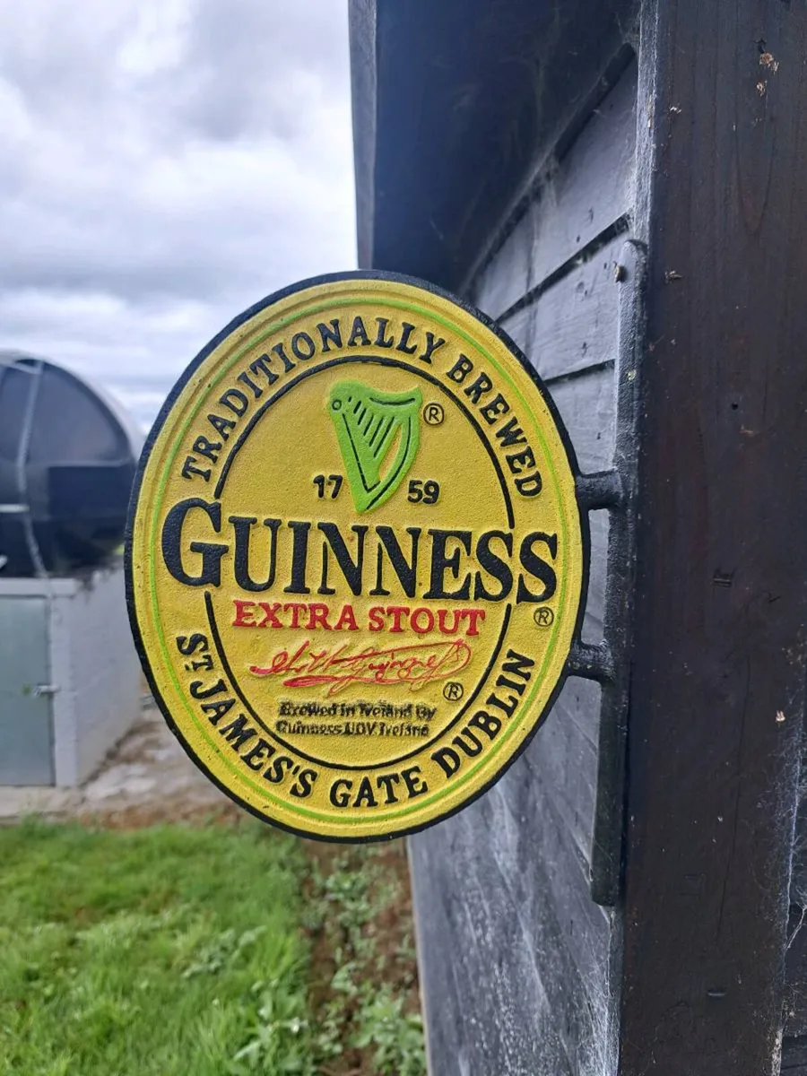 Guinness  bracket  2 sided cast iron sign - Image 1