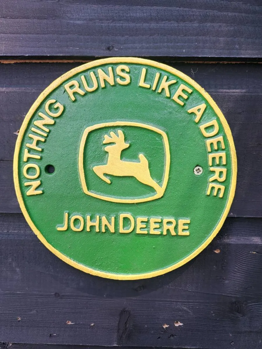 John deer cast iron sign - Image 1