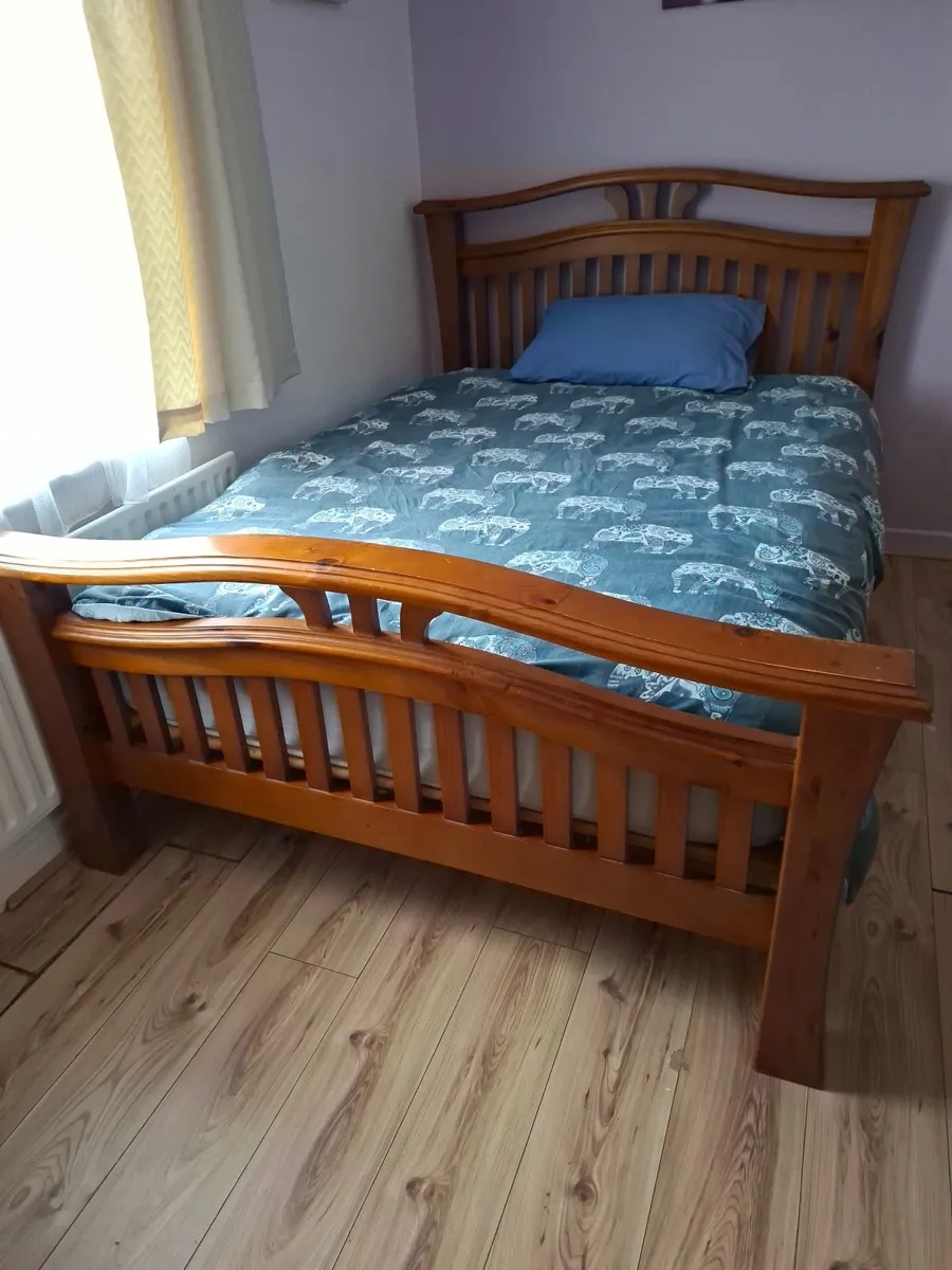 Bathroom  sink and double bed - Image 1