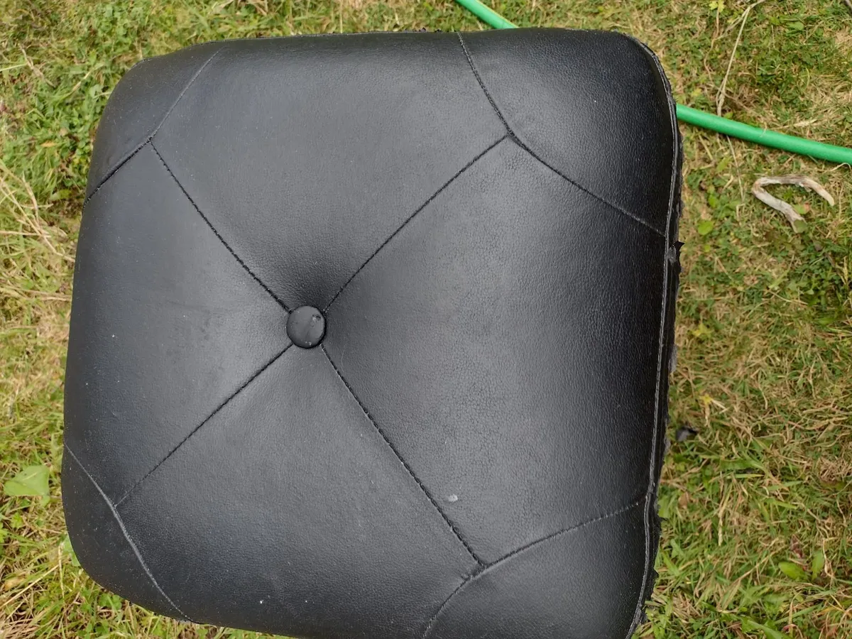 Black padded faux leather cube stool - Image 1