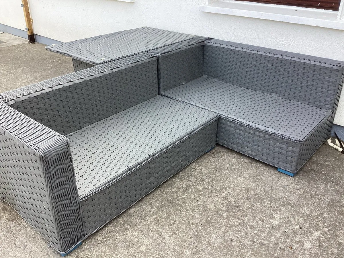 Grey Rathan corner sofa and table set - Image 1
