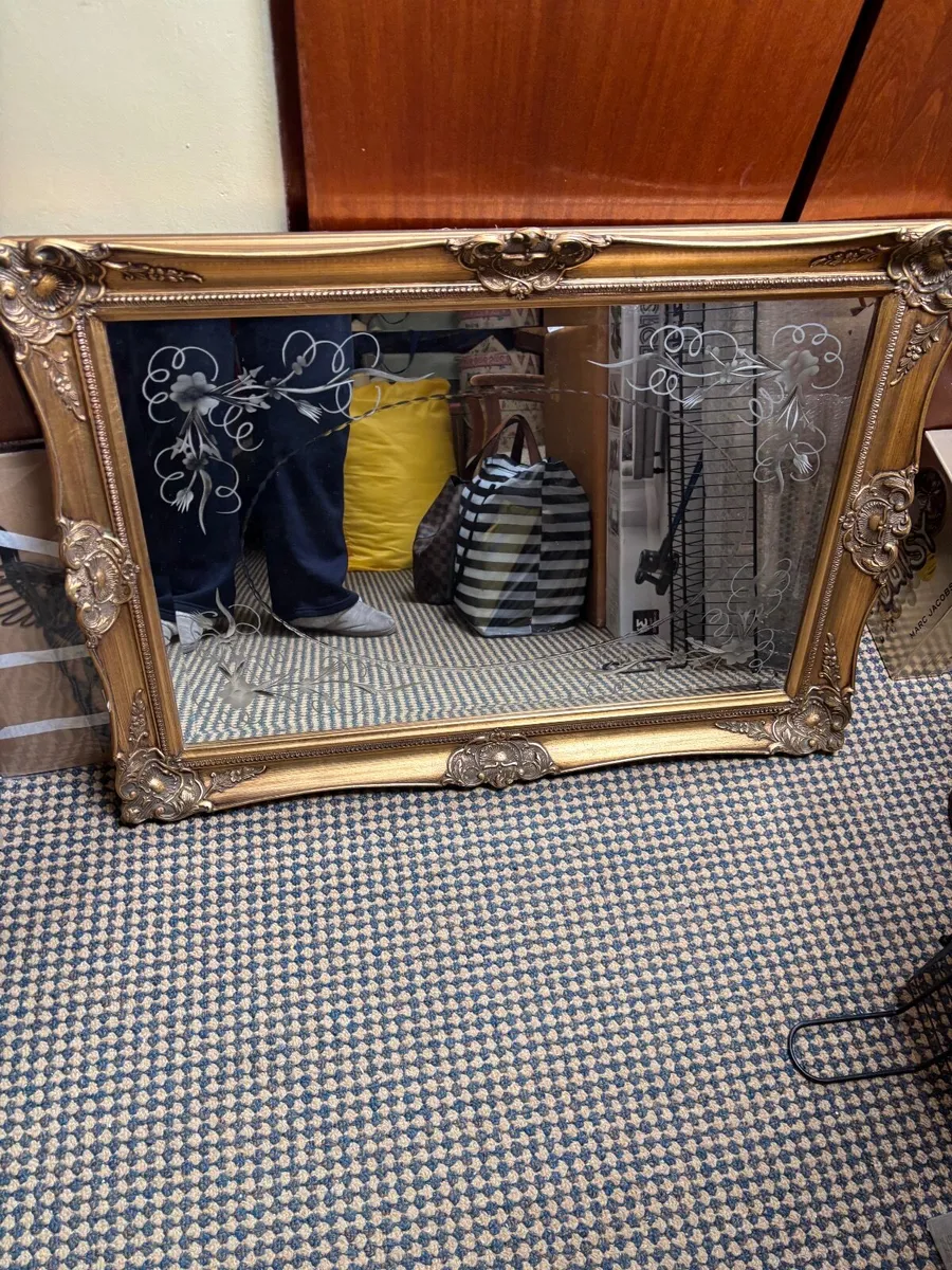 Large gold framed bevelled mirror