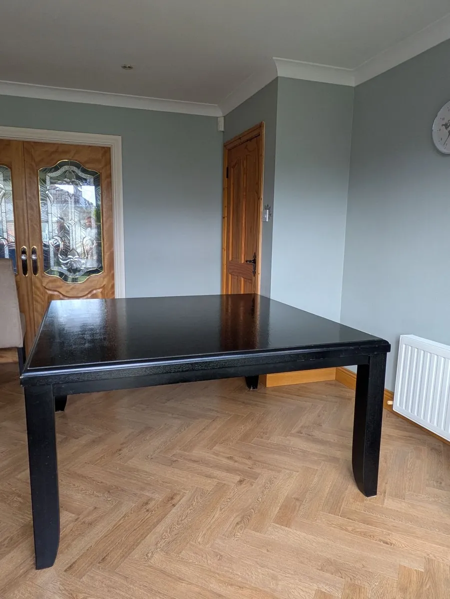 Elegant Black Dining Table - Image 1