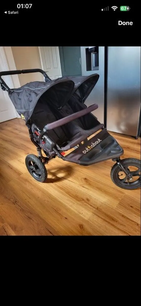 Out n about double buggy with raincover - Image 2