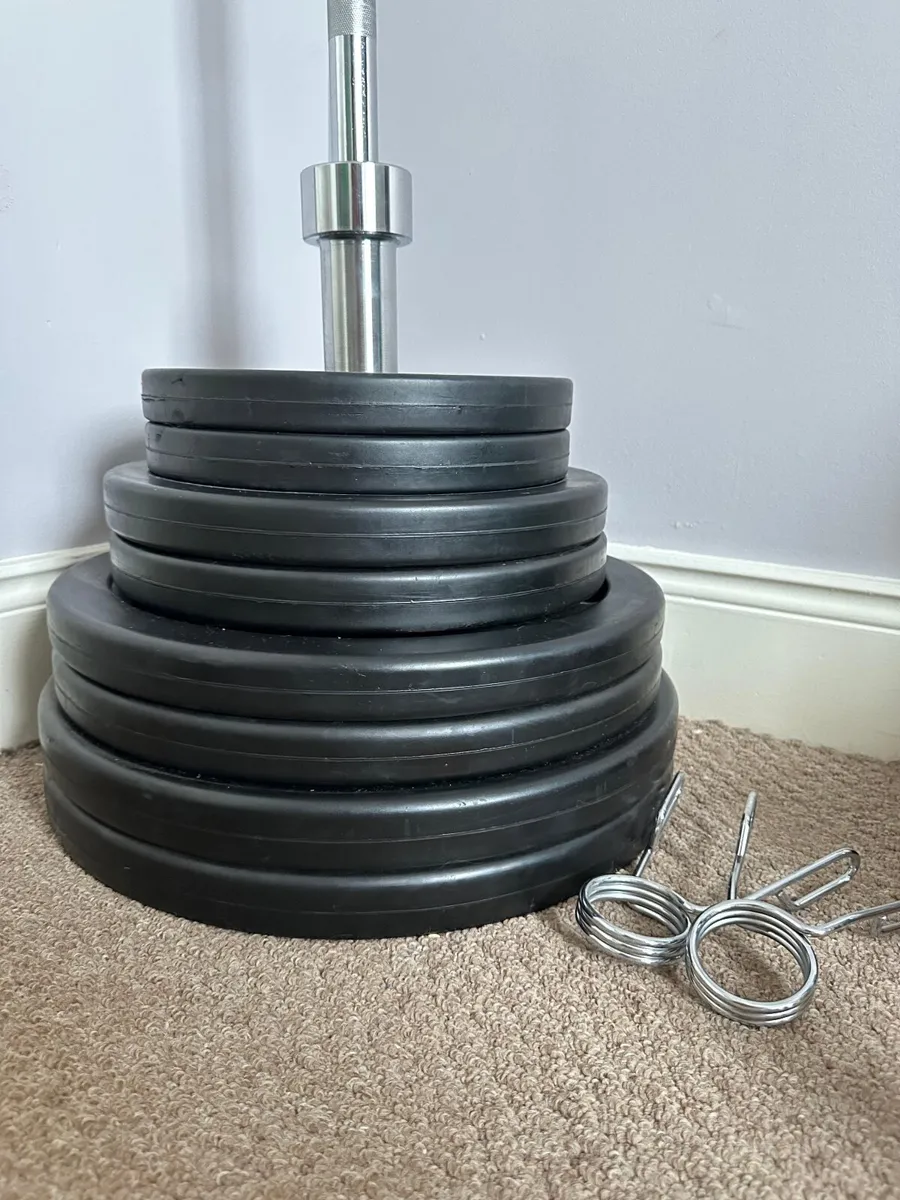 Olympic bar 20 kg  + 100kg EXL plates - Image 1