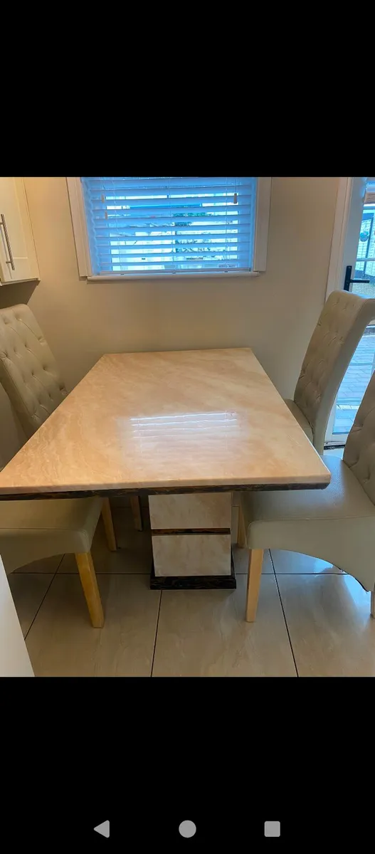 Table and Four Chairs - Image 1
