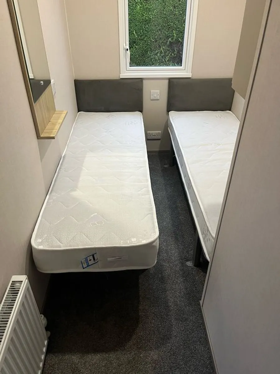 2 x single compact beds and mattress - Image 1