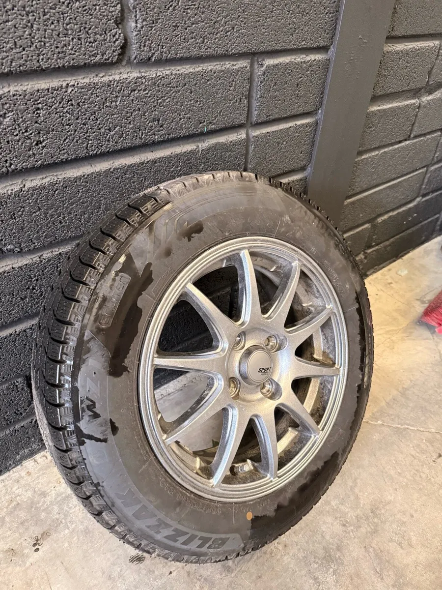 Sport alloy wheel with great tires - Image 1