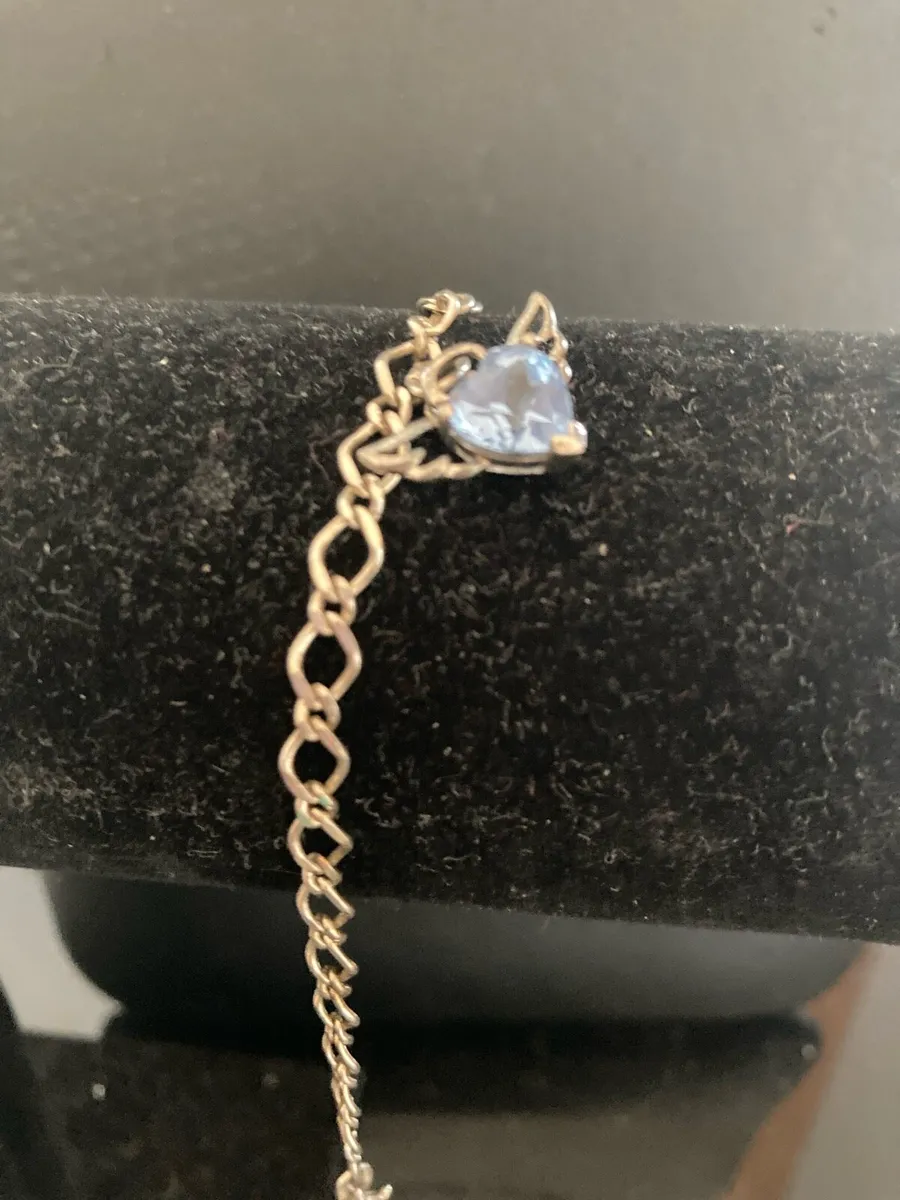 Sterling Silver bracelet with blue stone charm - Image 1